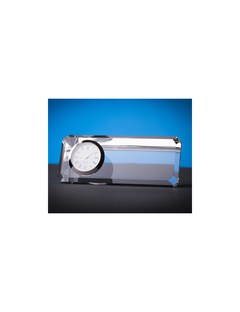 Kryształowy przycisk do papieru z zegarem...